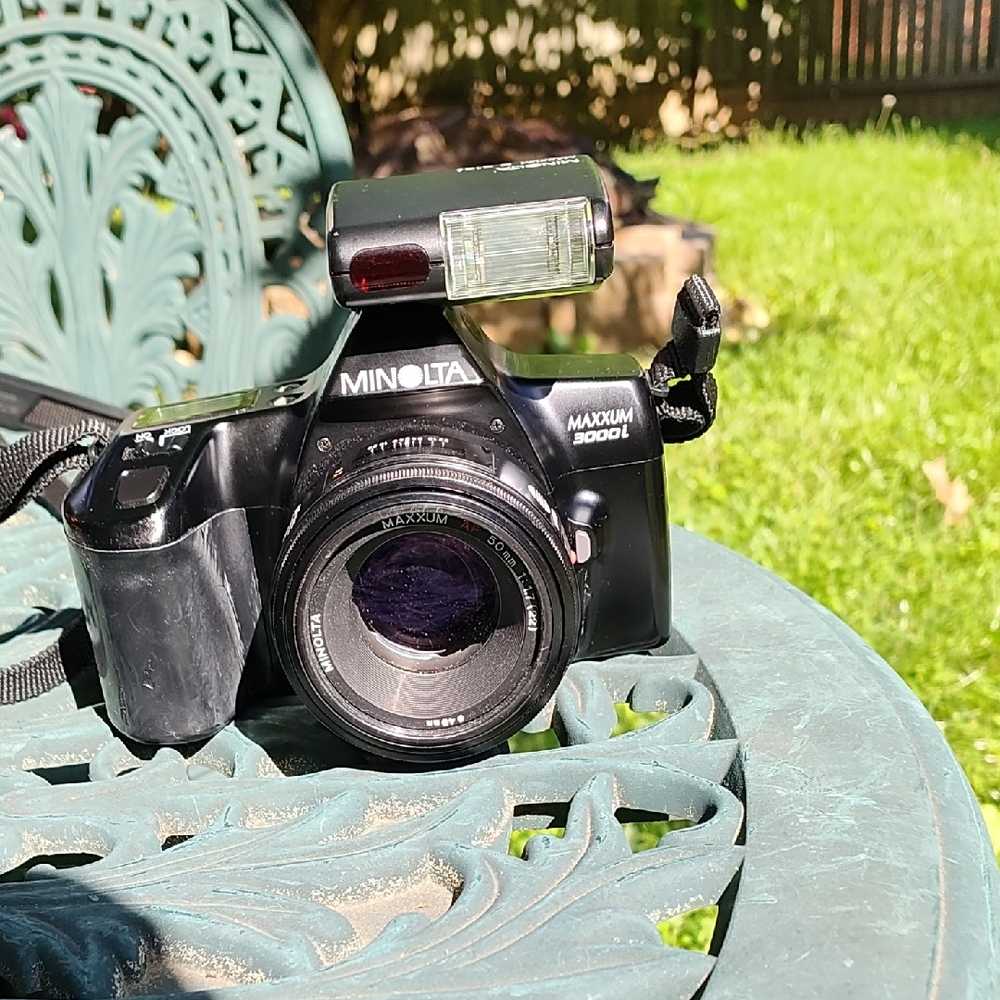 Black Digital SLR Camera with Prime Lens